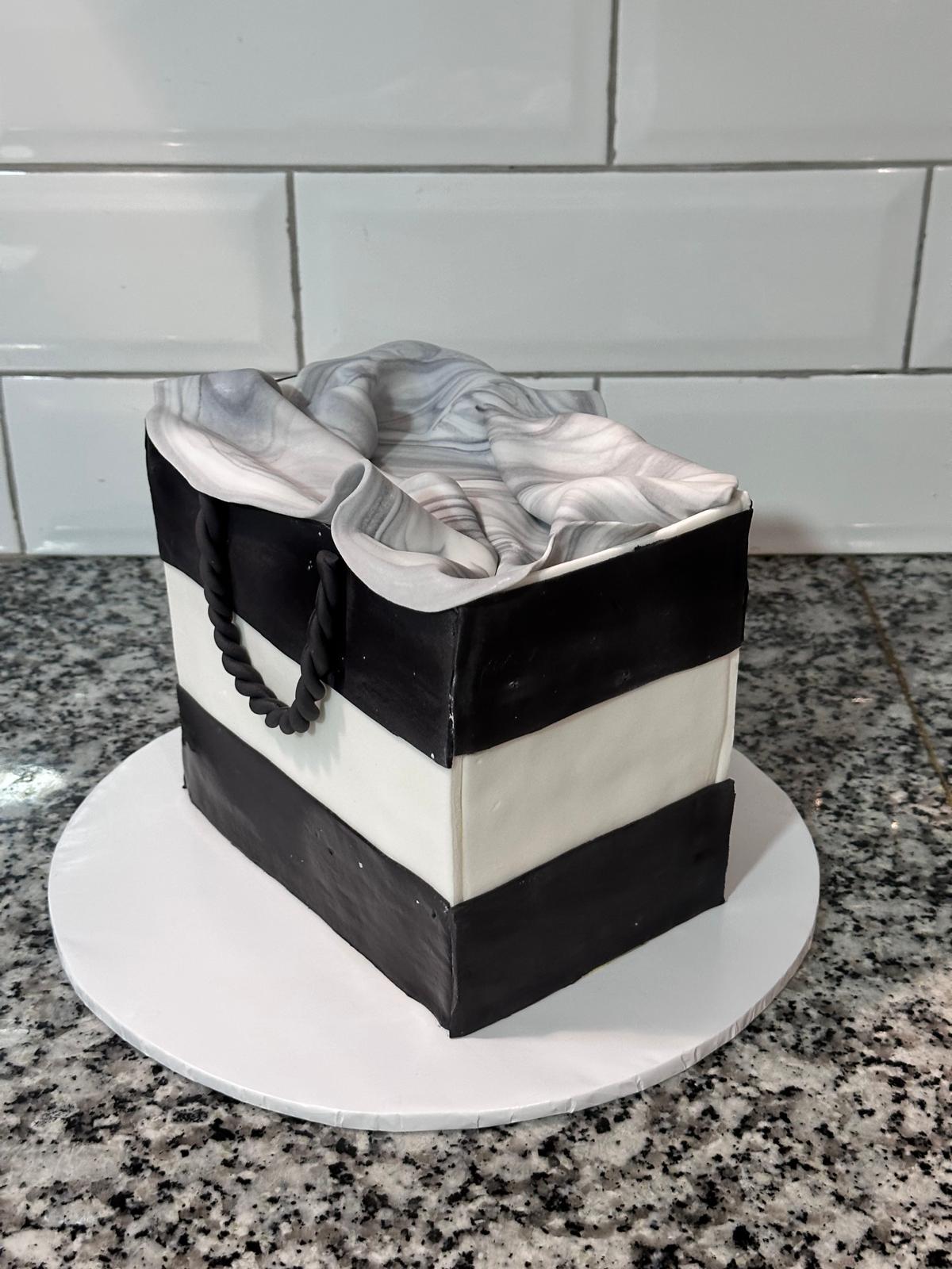 Black and white striped designer-style cake