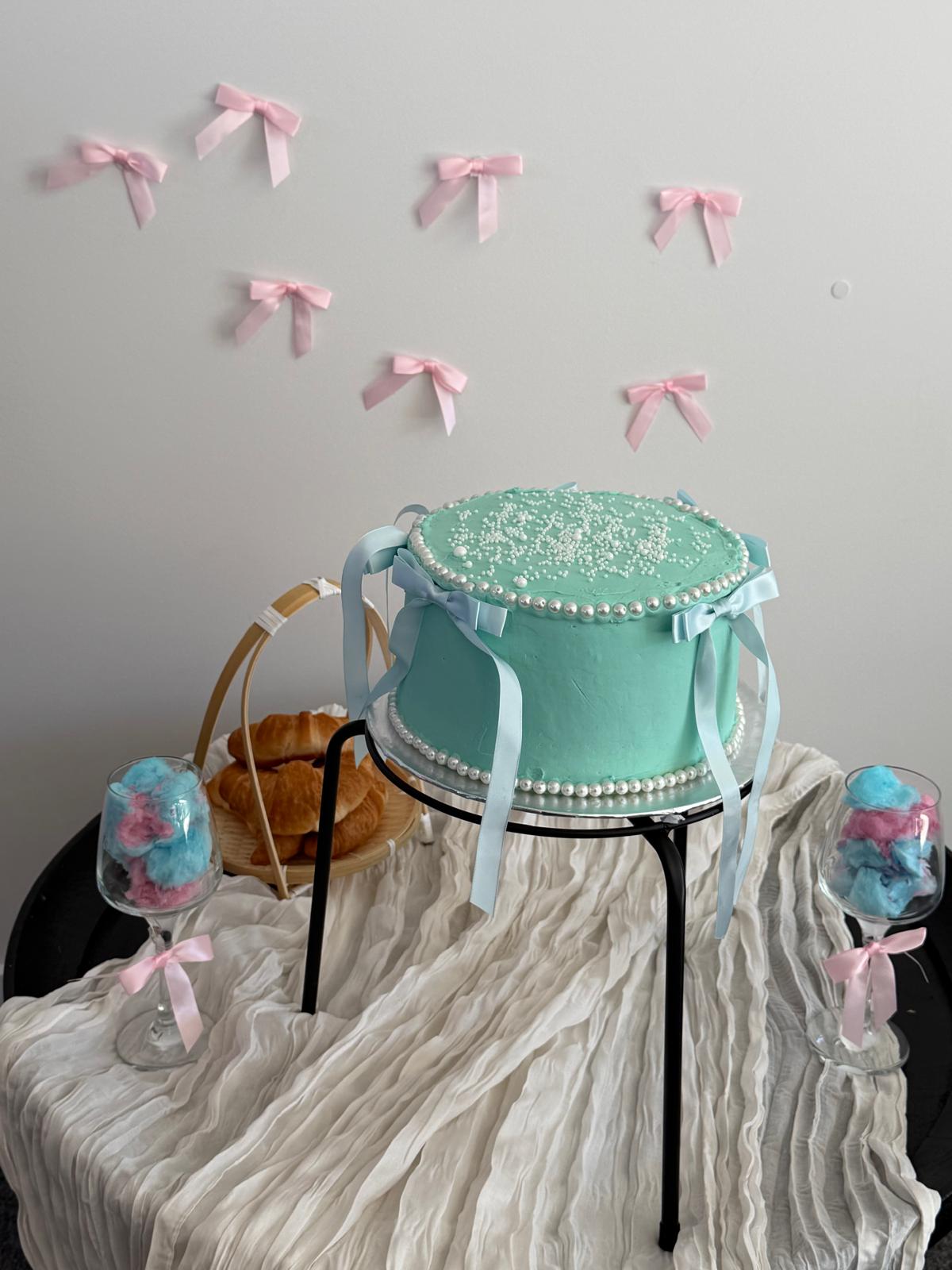 Mint and pink baby celebration cake