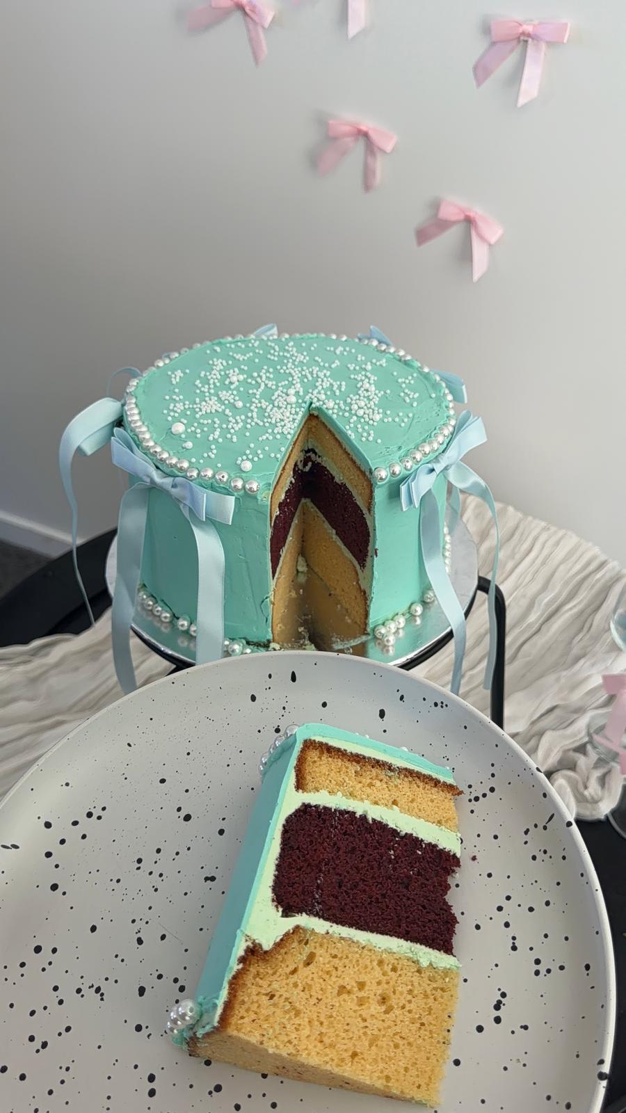 Cross-section of vanilla and berry layer cake